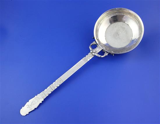 An early 20th century Turkish? silver serving ladle or small pan, 13.5 oz.